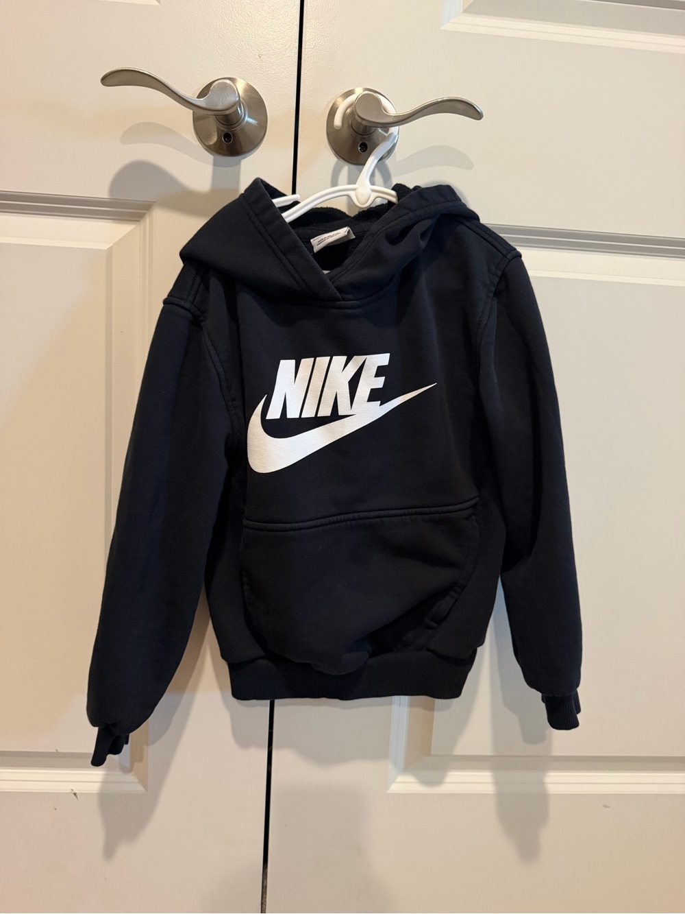 Nike Kids Black Hoodie with White Swoosh Logo